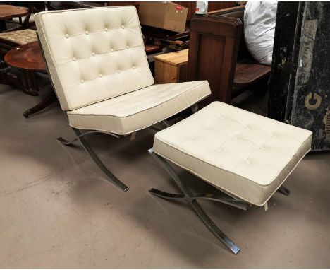 A modern low seat easy chair and pouffe, with chrome frame, in buttoned cream hide 