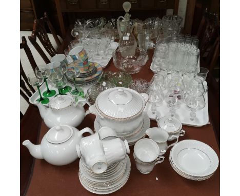 A Chodziez dinner and tea service, white with gilt borders; a part tea set, coloured square pattern; Three glass fruit bowls;