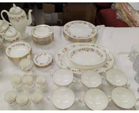 A large Wedgwood Mirabelle part dinner and tea service with floral decoration and gilt borders 