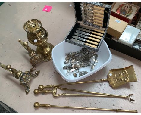 A Victorian style set of 3 brass fire irons and dogs; a brass oil lamp; a fish canteen, cased; silver plated cutlery 