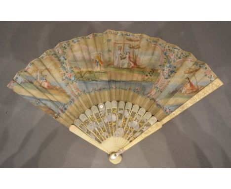 An 18th Century Fan, hand painted with classical figures within cartouches, the ivory pierced sticks inlaid with mother of pe