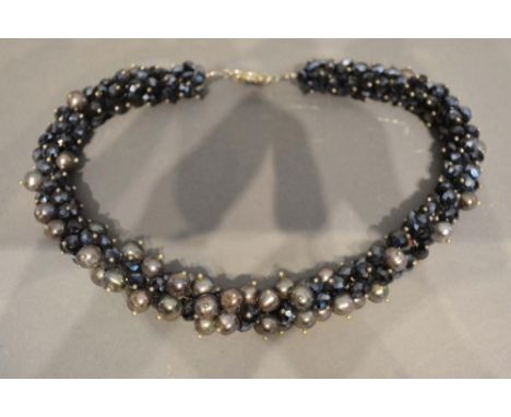 A Grey Pearl and Dark Crystal Choker with silver clasp 