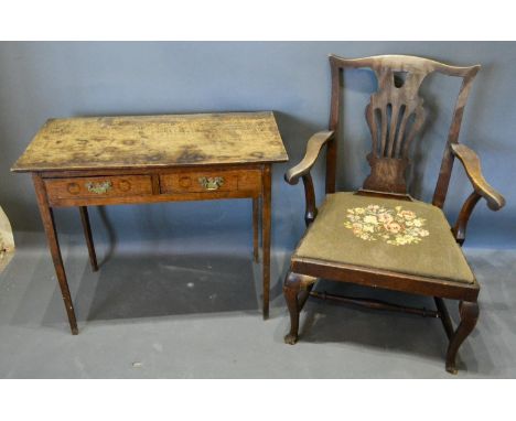 A 19th Century Oak Side Table, the plank top above two frieze drawers with brass drop handles raised upon square tapering leg