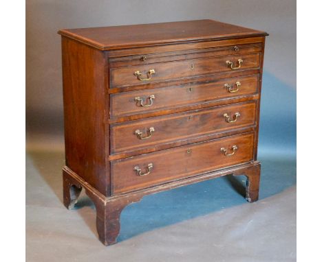 A 19th Century Mahogany Satinwood Crossbanded and Inlaid Bachelor's Chest, the moulded top above a brushing slide and four gr