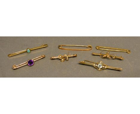 A 15 Carat Gold Aquamarine and Pearl Set Bar Brooch, together with six other similar bar brooches, 14 grammes 