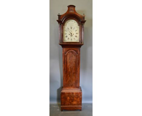 A George III Mahogany Longcase Clock, the pagoda topped hood with turned pillars above an arched door with conforming plinth 