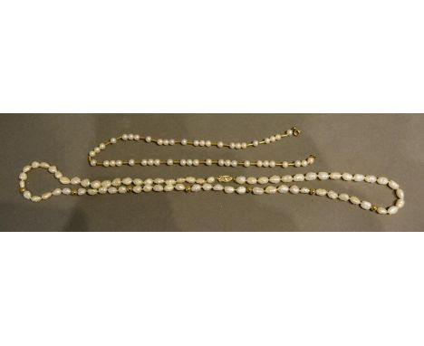 A 14 Carat Gold Pearl Necklace, together with a similar 18 carat gold pearl necklace 