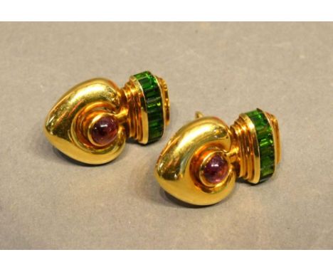 A Pair of Heavy 18 Carat Gold Ear Clips, each of heart drop form set with a band of baguette emeralds and each with a cabocho