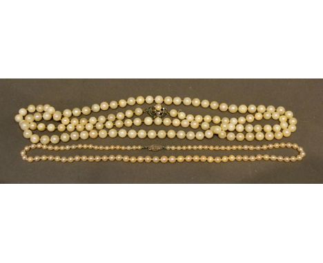 A Single Row Cultured Pearl Necklace with 9 carat white gold clasp, together with another cultured pearl necklace 