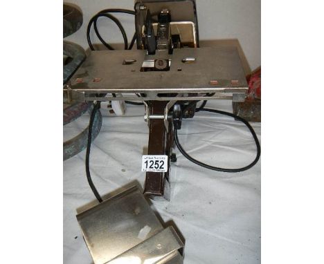 A Rapid 2 EL bench mount industrial electric stapler.