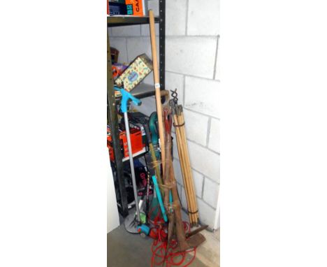A quantity of garden tools, metal detector, drain rods, etc.
