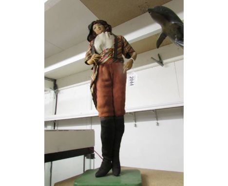 A vintage cloth costume doll, 57cm tall.