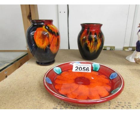 2 Poole Pottery vases and a Poole pottery tray,
