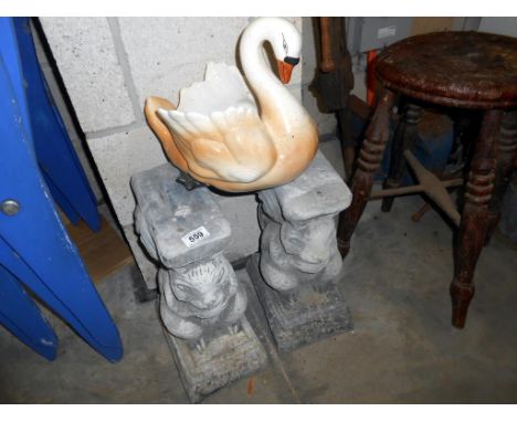 2 stone garden bench pillars (missing seat) plus a pottery swan planter