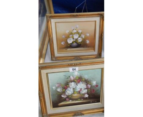 A pair of oil on canvas floral studies signed R Cox and Contaul, 35 x 29 cm.