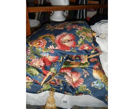 A good pair of curtains with tie backs.