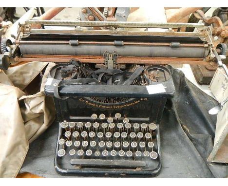 An L C Smith Corona typewriter.