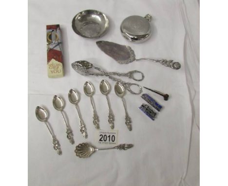 7 (800) continental silver spoons, an Islay malt whisky flask, a Barrowdale metal dish, cake slice, tongs etc.,