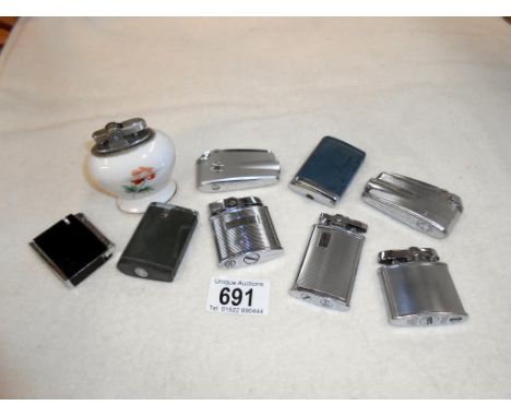 A quantity of 9 vintage lighters including 7 Ronson