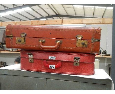 2 vintage suitcases.