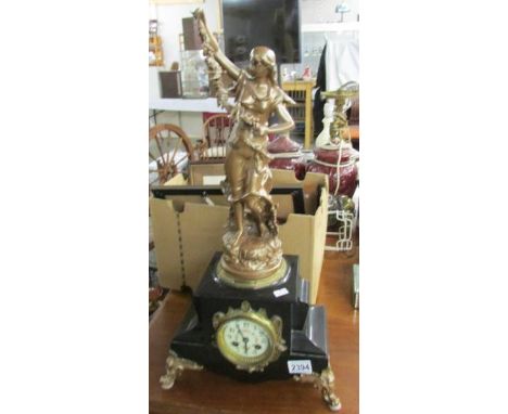 A 19th century French clock with ormolu mounts, enamel dial and surmounted female figure, a/f.