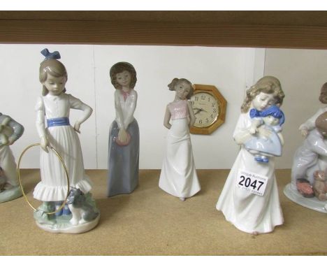 4 NAO by Lladro girl figurines.