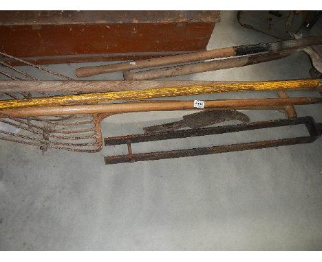 A quantity of garden tools.