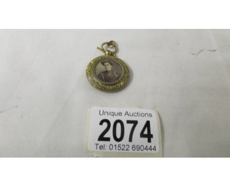 A vintage photo locket.