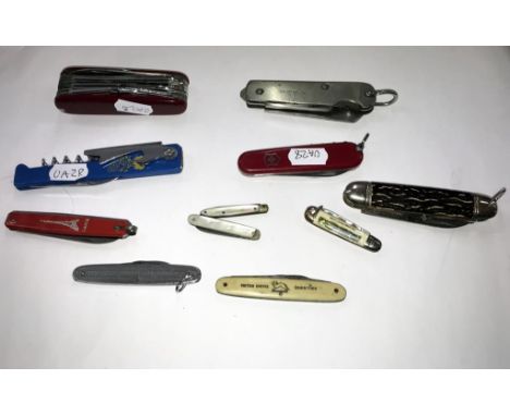 Eleven assorted pen knives including Swiss Army Knife, British Empire Exhibition knife etc., ****Condition report**** 2 small
