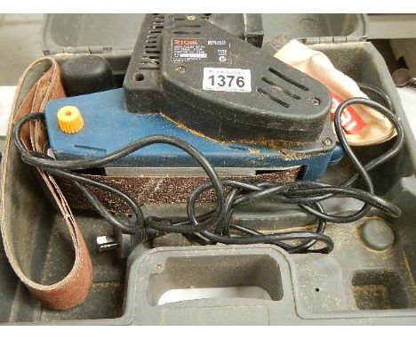 A Ryobi sander,