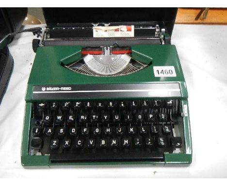 A Silver Reed portable typewriter.