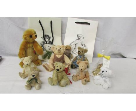 A mixed lot of small teddy bears, 2 Steiff bags etc.,