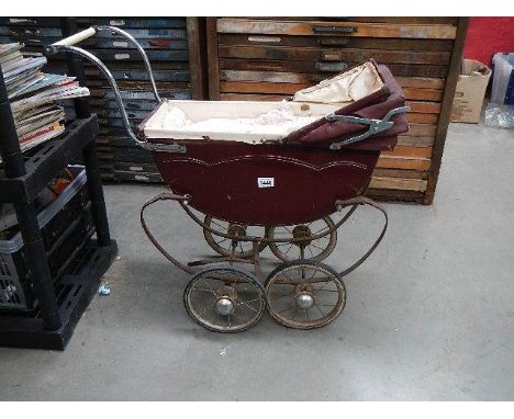 A vintage dolls pram, a/f.