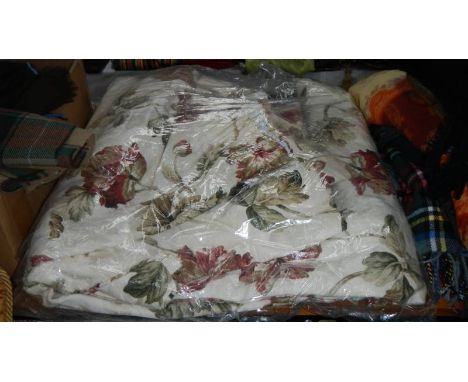A pair of  floral curtains.
