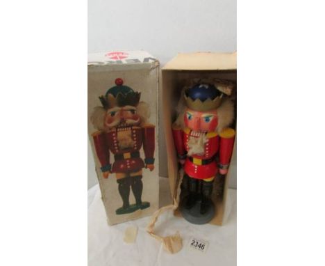 A vintage boxed soldier nutcracker.
