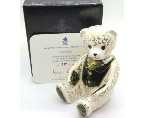 Boxed Royal Crown Derby Harrods teddy with certificate, Limited Edition 827/1500. Signed to base and gold stopper, H: 11 cm. 