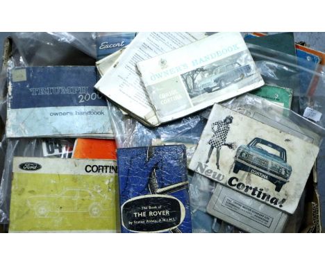 Approximately fifty mixed vintage car manuals and literature to include Aston Martin, Hilman, Triumph etc. Not available for 