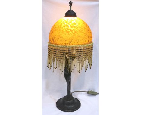 Large cast metal figural table lamp with beaded fringe amber glass shade, H: 40 cm. P&amp;P Group 3 (£25+VAT for the first lo