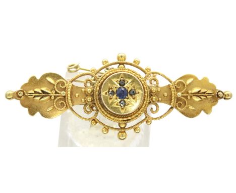 15ct gold filigree brooch set with blue stones, L: 40 mm, 3.8g. P&amp;P Group 1 (£14+VAT for the first lot and £1+VAT for sub