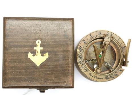 Boxed brass sundial compass marked West London. P&amp;P Group 1 (£14+VAT for the first lot and £1+VAT for subsequent lots) 
