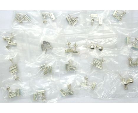 Twenty pairs of silver earrings. P&amp;P Group 1 (£14+VAT for the first lot and £1+VAT for subsequent lots) 