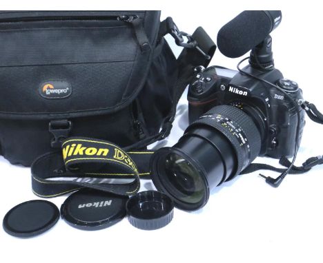 Nikon D300 digital camera, plus AF 24-120mm 3.5-5.6D lens in a Lowepro camera bag. Camera powers up and appears to be in full