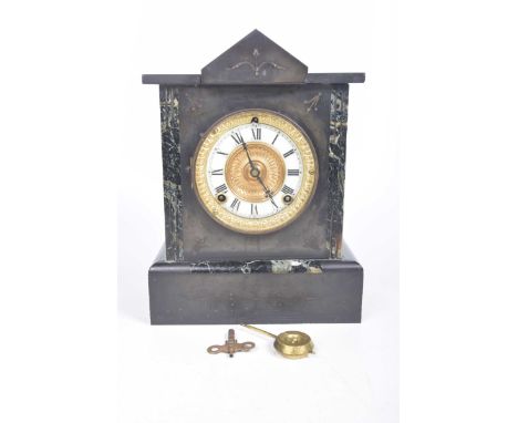 A Victorian black slate mantel clockThe architectural black casing inlaid with carved green marble panels, the central white 