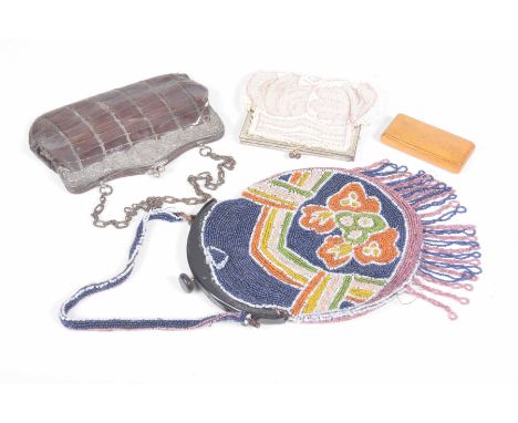 A collection of early to mid 20th Century ladies handbagsTo include a silver and animal skin ladies purse, stamped 925 with i