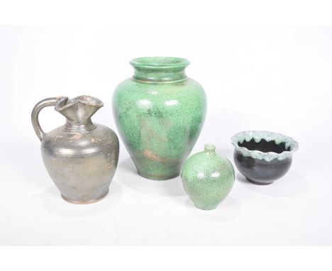 A collection of various glazed pottery vasesTo include a green glazed amphora shaped vase, 20cm high, a green and black glaze