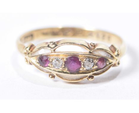 A ruby and diamond five stone ringTo a scalloped surround in 18k gold, weight approx. 2.5g