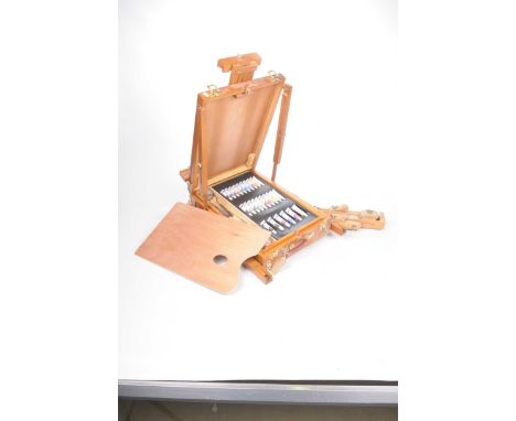Two artist's easelsThe first by Windsor & Newton, London, the second a travelling box easel with carry handle, the hinged cas