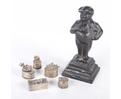 A patinated cast iron figure of a Court OfficialThe rotund figure wearing court dress and hat, raised on a square stepped bas