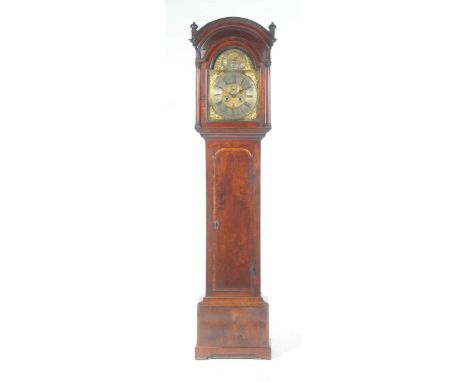 A George II mahogany cased longcase clock by Richard France, Warrington, (1720-1740)The arched pediment above slender taperin