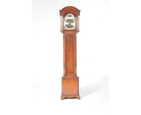 A Good quality reproduction Georgian style mahogany longcase clock by James Stuart, ArmaghHaving an arched pediment above a 9